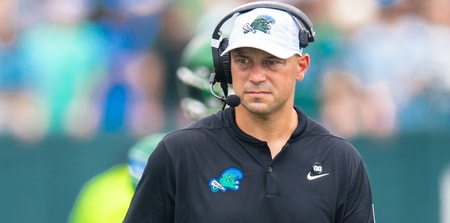 Aug 30, 2025; New Orleans, Louisiana, USA; Tulane Green Wave head coach Jon Sumrall looks on against Northwestern Wildcats during the first half at Yulman Stadium. Mandatory Credit: Stephen Lew-Imagn Images
