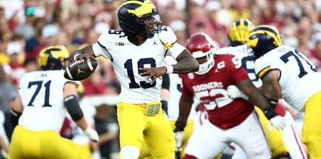 Sep 6, 2025; Norman, Oklahoma, USA; Michigan Wolverines quarterback Bryce Underwood (19) looks to pass downfield against the Oklahoma Sooners during the first half at Gaylord Family-Oklahoma Memorial Stadium. Mandatory Credit: Kevin Jairaj-Imagn Images