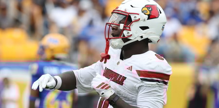 Sep 27, 2025; Pittsburgh, Pennsylvania, USA; Louisville Cardinals wide receiver Chris Bell (0) celebrates his touchdown against the Pittsburgh Panthers during the second quarter at Acrisure Stadium. Mandatory Credit: Charles LeClaire-Imagn Images