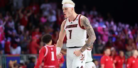 Nov 27, 2024; Paradise Island, Bahamas, BHS; Louisville Cardinals forward Kasean Pryor (7) reacts after dunking during the second half against the Indiana Hoosiers at the Atlantis Resort. Mandatory Credit: Kevin Jairaj-Imagn Images