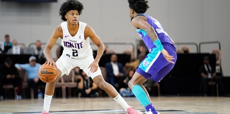 Dec 22, 2022; Las Vegas, NV, USA; NBA G League Ignite guard London Johnson (2) dribbles the ball against Greensboro Swarm guard Kobi Simmons (2) during the first half at Mandalay Bay Convention Center. Mandatory Credit: Lucas Peltier-Imagn Images