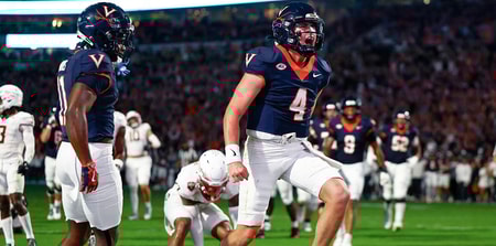 Virginia QB Chandler Morris celebrates a touchdown in the Cavaliers’ 2OT shootout against Florida State. (Geoff Burke / Imagn Images)