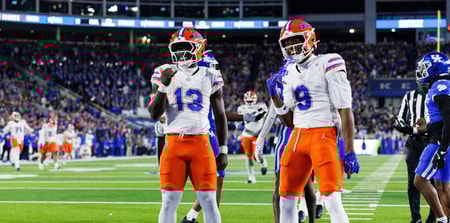 Nov 8, 2025; Lexington, Kentucky, USA; Florida Gators running back Jadan Baugh (13) celebrates with wide receiver J. Michael Sturdivant (9) after scoring a touchdown during the first quarter against the Kentucky Wildcats at Kroger Field. Mandatory Credit: Jordan Prather-Imagn Images