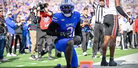 Nov 22, 2025; Dallas, Texas, USA; SMU Mustangs wide receiver Jordan Hudson (2) celebrates after he scores a touchdown against the Louisville Cardinals during the first half at Gerald J. Ford Stadium. Mandatory Credit: Jerome Miron-Imagn Images