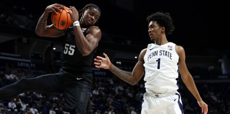 Michigan State Spartans forward Coen Carr (55) jumps for the rebound during the first half against the Penn State Nittany Lions at Bryce Jordan Center. - Matthew O'Haren, USA TODAY Sports