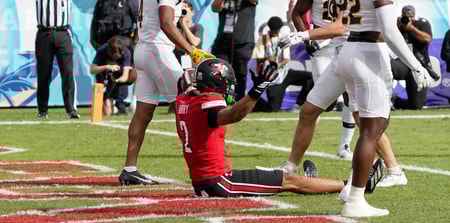 Dec 23, 2025; Boca Raton, FL, USA;Louisville Cardinals wide receiver Treyshun Hurry (2) celebrates a touchdown reception against the Toledo Rockets in the first quarter at Flagler CU Stadium. Mandatory Credit: Jeff Romance-Imagn Images