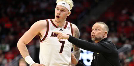 Feb 4, 2026; Louisville, Kentucky, USA; Louisville Cardinals head coach Pat Kelsey talks with forward Kasean Pryor (7) during the second half against the Notre Dame Fighting Irish at KFC Yum! Center. Louisville defeated Notre Dame 76-65. Mandatory Credit: Jamie Rhodes-Imagn Images