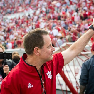 Indiana Head Coach Curt Cignetti holds up the number one to the crowd as he leaves the field after the Indiana versus Wisconson