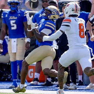 2026-09-05T235920Z_901370413_MT1USATODAY29751894_RTRMADP_3_TULSA-WIDE-RECEIVER-ORAN-SINGLETON-2-CATCHES-A-PASS-WHILE