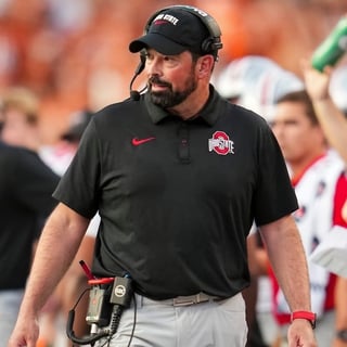 2026-09-18T012434Z_803470901_MT1USATODAY29844058_RTRMADP_3_OHIO-STATE-BUCKEYES-HEAD-COACH-RYAN-DAY-WATCHES-FROM-THE (1)
