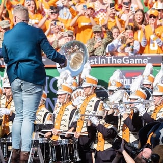 2025-06-16T181332Z_428670352_MT1USATODAY26468747_RTRMADP_3_PEYTON-MANNING-DIRECTS-THE-PRIDE-OF-THE-SOUTHLAND-BAND-AS (1)