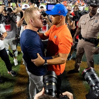 2026-09-20T030704Z_1932107654_MT1USATODAY29868360_RTRMADP_3_AUBURN-TIGERS-HEAD-COACH-ALEX-GOLESH-AND-FLORIDA-GATORS-HEAD (1)