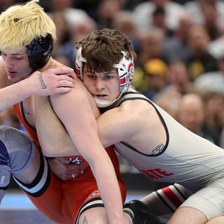 2026-03-22T152302Z_843476538_MT1USATODAY28563971_RTRMADP_3_OKLAHOMA-STATE-S-JAX-FORREST-LEFT-WRESTLES-OHIO-STATE-S (1)
