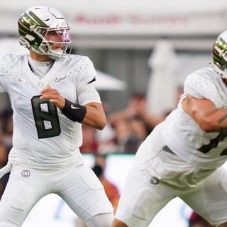 Oregon quarterback Dylan Raiola throws a pass as the Oregon Ducks face the USC Trojans on Sept. 26, 2026, at Los Angeles