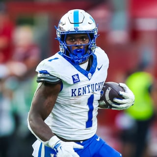 Oct 3, 2026; Columbia, South Carolina, USA; Kentucky Wildcats running back CJ Baxter (1) rushes against the South Carolina Gamecocks in the second half at Williams-Brice Stadium. Mandatory Credit: Jeff Blake-Imagn Images