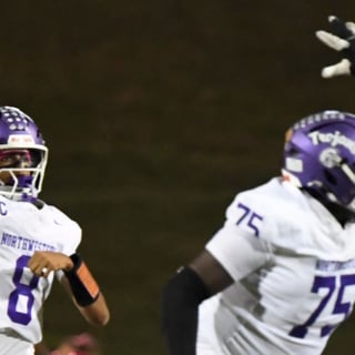 imresizer-resize-2026-10-10T035129Z_47142605_MT1USATODAY30042572_RTRMADP_3_NORTHWESTERN-TROJANS-XAVIER-MEANS-8-THROWS-THE-BALL-DURING