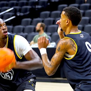Mark Mitchell looks past CJ Gunn