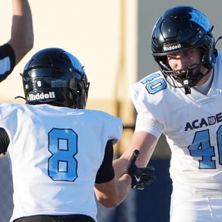 NFL Academy's Leon Donato (8) and Silas Fløche (40) celebrate a touchdown at Hoban, Aug. 28, 2026.