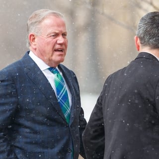 2026-03-16T201359Z_1266297718_MT1USATODAY28515798_RTRMADP_3_BRIAN-KELLY-LEFT-ARRIVES-AT-THE-FUNERAL-SERVICE-FOR-FORMER (1)