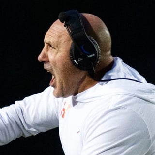 Heritage head football coach Joe Osovet yells during a football game at Heritage high school on Thursday, Oct. 19, 2023.