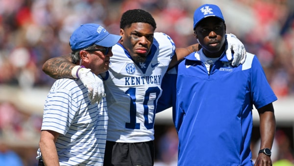 OXFORD, MS - OCTOBER 01: Kentucky linebacker Jacquez Jones (10) is helped off the filed after being injured during the college football game between the Kentucky Wildcats and the Ole' Miss Rebels on October 01, 2022, at Vaught-Hemingway Stadium in Oxford,