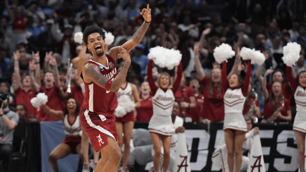 Alabama G Aaron Estrada celebrates in the NCAA Tournament