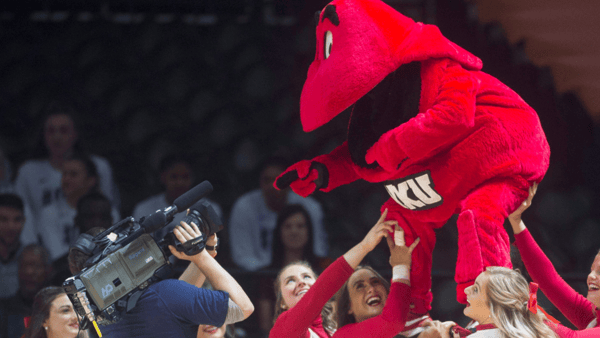 Western Kentucky Hilltoppers cheerleaders hold their mascot Big Red as they perform - © Caitie McMekin / USA TODAY NETWORK