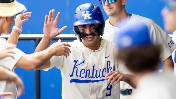 Kentucky Baseball's Nick Lopez is congratulated by his teammates - Chet White, UK Athletics