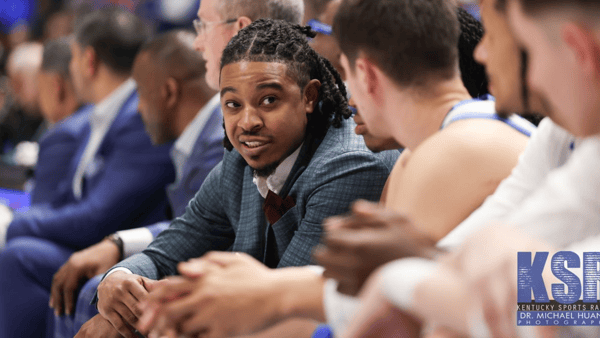 Tyler Ulis coaches from the Kentucky bench