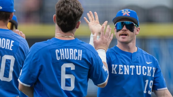 Kentucky Baseball players high-five each other - Tyler Ruth, UK Athletics