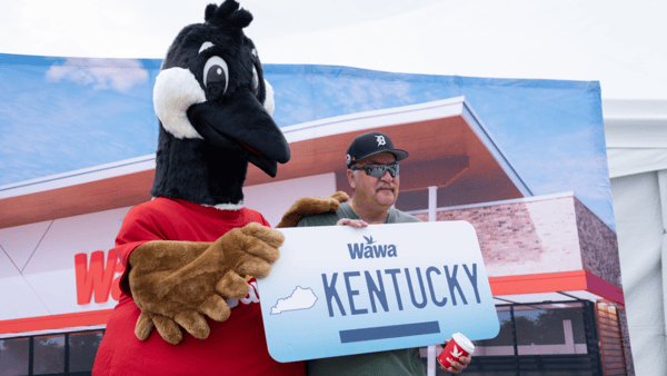 Dennis Hagel poses with the Wawa bird during the groundbreaking for the future Wawa site at Preston Crossing Blvd on Wednesday, June 5, 2024 - © Clare Grant/Courier Journal / USA TODAY NETWORK