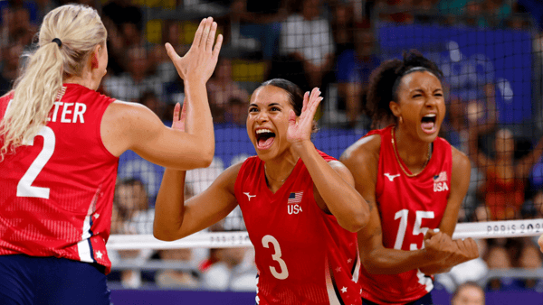 Jul 31, 2024; Paris, France; United States outside hitter Avery Skinner (3) celebrates with setter Jordyn Poulter (2) after a play against Serbia in a pool A match during the Paris 2024 Olympic Summer Games at South Paris Arena 1. Mandatory Credit: Yukihito Taguchi-USA TODAY Sports