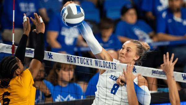 Brooke Bultema attacks at the net against Morehead - UK Athletics