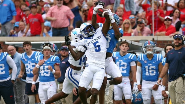 Kentucky CB DJ Waller breaks up a pass to Ole Miss WR Juice Wells