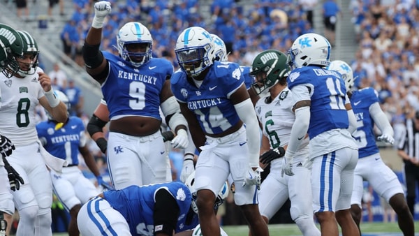 Ty Bryant and the Kentucky defense celebrate a stop, via Dr. Michael Huang, KSR