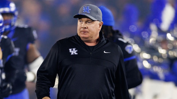 Kentucky Wildcats head coach Mark Stoops runs onto the field before a game against the Vanderbilt Commodores at Kroger Field. Mandatory Credit: Jordan Prather-Imagn Images