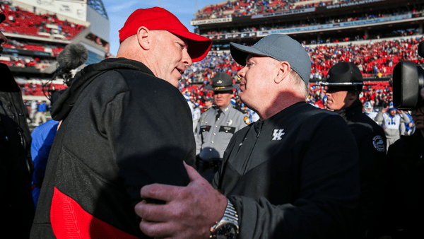 Louisville''s Jeff Brohm and Kentucky head coach Mark Stoops after the Governor's Cup,