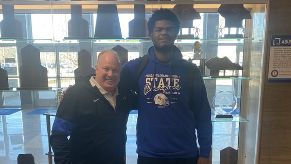 Mark Stoops (left) and Jarvis Strickland - @coachthomp9