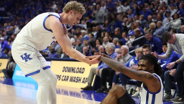Collin Chandler helps Otega Oweh up during the win over LSU - Dr. Michael Huang, Kentucky Sports Radio