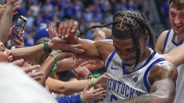 Otega Oweh celebrates with fans after hitting the game-winner for Kentucky vs. Oklahoma in the SEC Tournament - Dr. Michael Huang, Kentucky Sports Radio