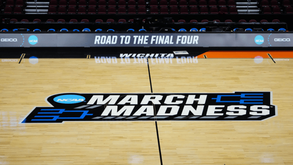 Mar 19, 2025; Wichita, KS, USA; The March Madness logo at midcourt at the Intrust Bank Arena. Mandatory Credit: Kirby Lee-Imagn Images