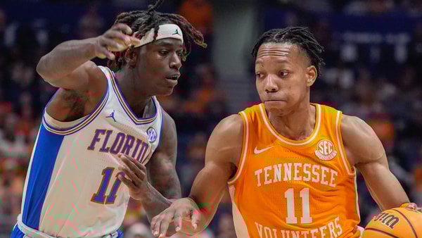 Tennessee guard Jordan Gainey (11) works his way past Florida guard Denzel Aberdeen (11) during the first half of the Southeastern Conference tournament championship at Bridgestone Arena in Nashville, Tenn., Sunday, March 16, 2025.