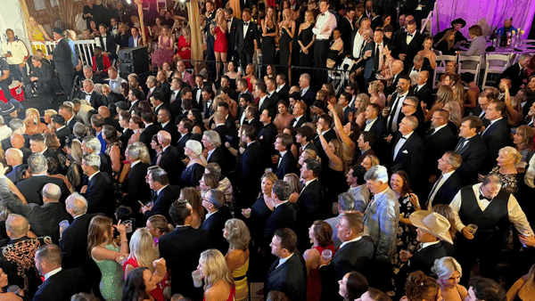 The crowd enjoys the celebrity guests on stage at the 35th annual Barnstable Brown Gala on Friday night. May 03, 2024 - Maggie Huber/Special to Courier Journal / USA TODAY NETWORK