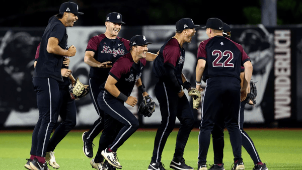 Bellarmine baseball celebrates a win over Louisville, via John Somers II, BU Athletics