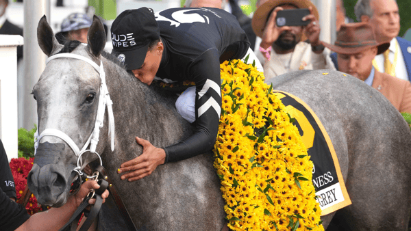Jaime Torres celebrates a Preakness Stakes win with Seize the Grey, via Mitch Stringer-Imagn Images