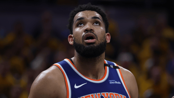 May 27, 2025; Indianapolis, Indiana, USA; New York Knicks center Karl-Anthony Towns (32) looks up at a scoreboard during the third quarter against the Indiana Pacers of game four of the eastern conference finals for the 2025 NBA Playoffs at Gainbridge Fieldhouse. Mandatory Credit: Trevor Ruszkowski-Imagn Images