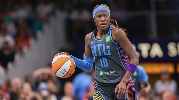May 22, 2025; Atlanta, Georgia, USA; Atlanta Dream guard Rhyne Howard (10) dribbles against the Indiana Fever in the first half at State Farm Arena. Mandatory Credit: Brett Davis-Imagn Images