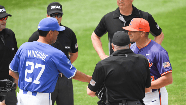 University of Kentucky Head Coach Nick Mingione and Clemson Head Coach Erik Bakich shake hands before the NCAA baseball Clemson Regional at Doug Kingsmore Stadium in Clemson, S.C. Sunday, June 1, 2025.