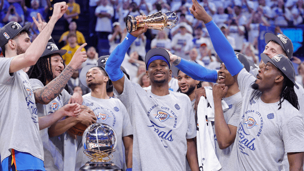 May 28, 2025; Oklahoma City, Oklahoma, USA; Oklahoma City Thunder guard Shai Gilgeous-Alexander holds up the MVP trophy for the western conference finals for the 2025 NBA Playoffs at Paycom Center. Mandatory Credit: Alonzo Adams-Imagn Images