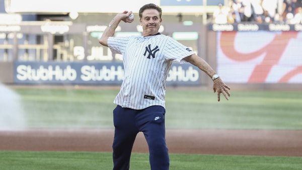 Rick Pitino throws out the first pitch at a Yankees game, via Wendell Cruz-Imagn Images
